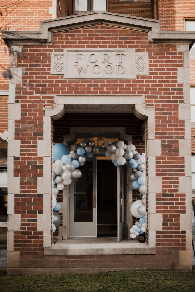 Blue & Silver Ballon Arch on Historic Fortwood Apartments Entryway